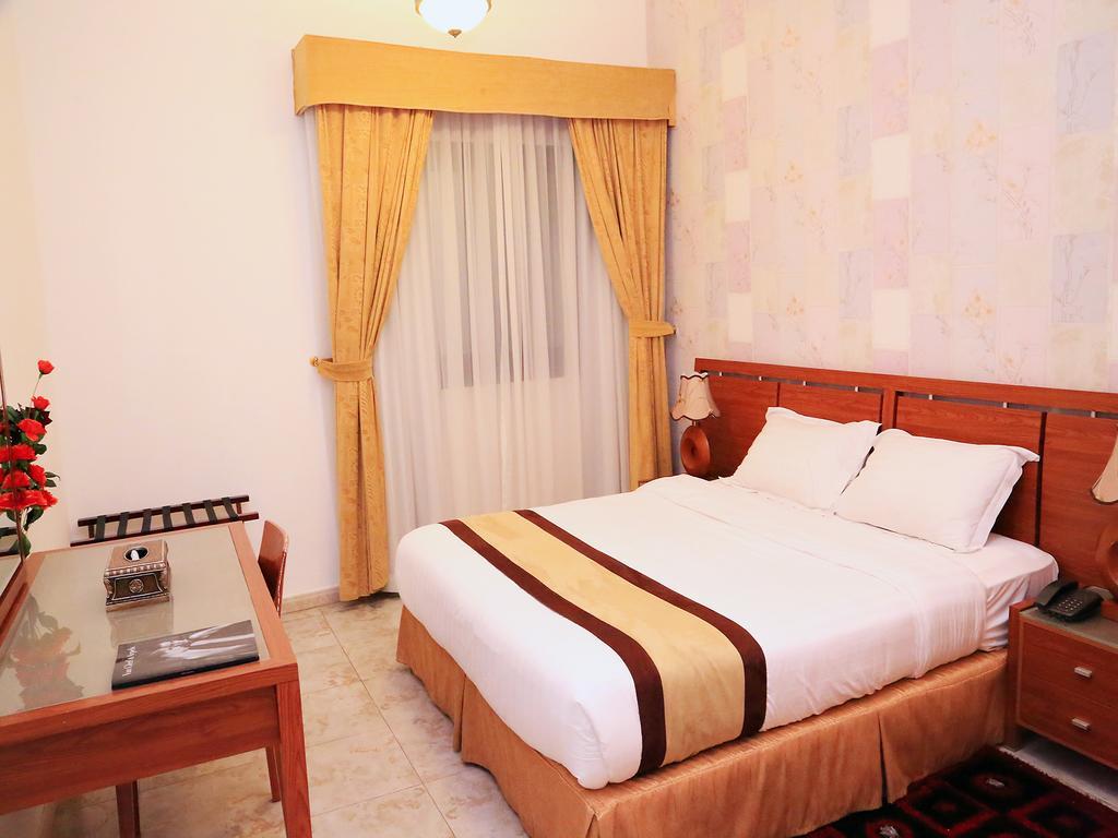 Arcadia Hotel Suites Sardzsa Szoba fotó